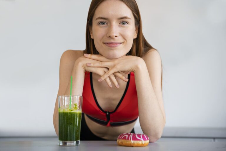 woman-with-smoothie-doughnut-front-view